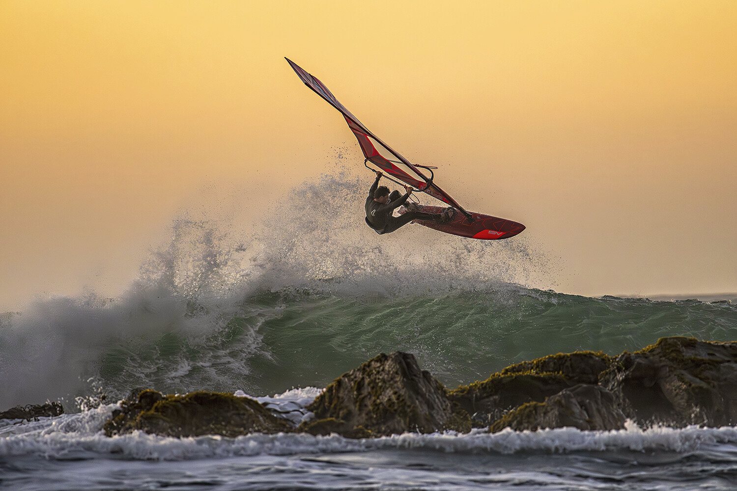 Windsurfing at sunset over the Matanzas rocks
